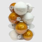 Fehér és arany gömbök szoros elrendezésben átlátszó tartóban (12×6 cm).