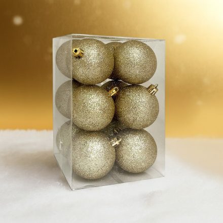 Arany glitteres karácsonyi gömb szett dobozban, havas háttérrel