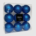 Kék glitteres műanyag karácsonyi gömbök átlátszó dobozban.