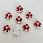 Piros-fehér mikulás kabát formájú öntapadós díszek, fehér háttéren, egy darab hátoldala látható.